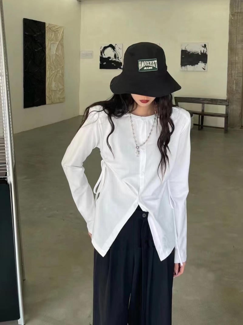 Gấu áo xẻ tà